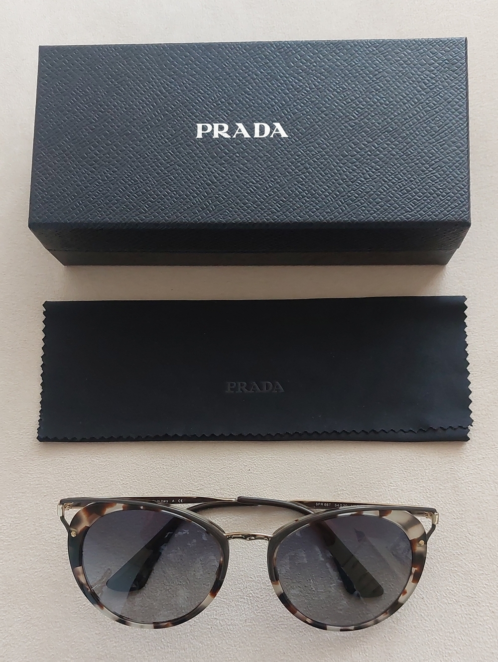 Prada Tortoiseshell Round Sunglasses with Gray Lenses